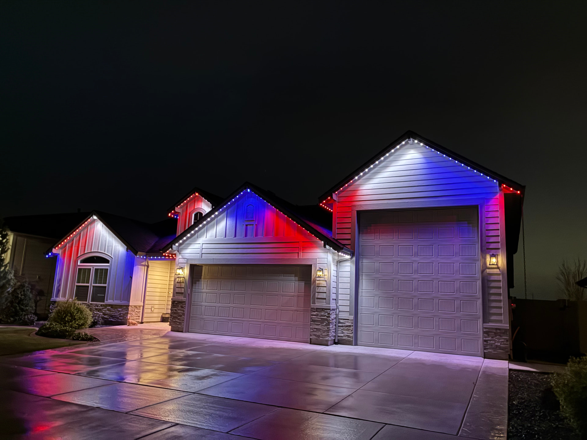 Single-story home with warm white lighting during installation